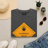 Funny Monday T-Shirt displayed on dark heather fabric with a flammable hazard graphic and MON-401 label.