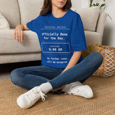 Funny Work T-Shirt - Officially Done for the Day tee worn by a woman sitting on a couch.