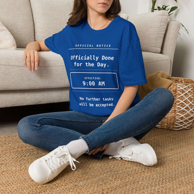 Funny Work T-Shirt - Officially Done for the Day tee worn by a woman sitting on a couch.
