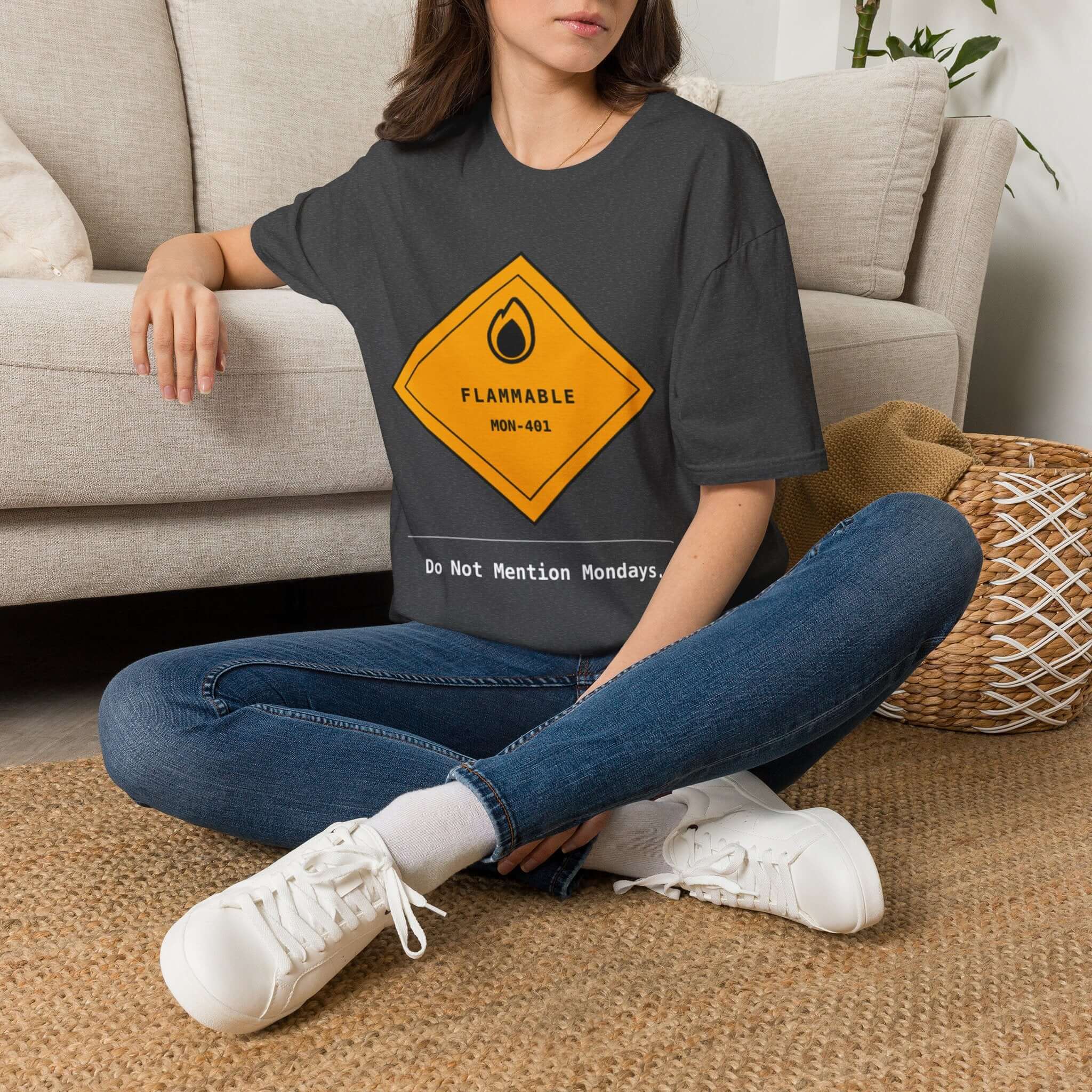 Funny Monday T-Shirt displayed on dark heather fabric with a flammable hazard graphic and MON-401 label.